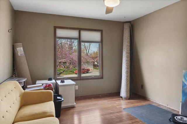 2236 E Marlan Ct, Springfield, MO 65802 - sitting room featuring wood finished floors, baseboards, and ceiling fan