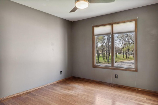 2236 E Marlan Ct, Springfield, MO 65802 - unfurnished room with ceiling fan, baseboards, and light wood-style flooring