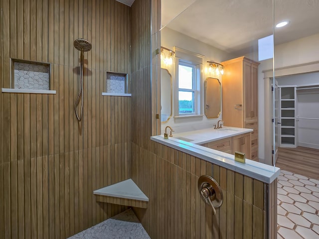 3800 W Broadmoor St, Springfield, MO 65807 - full bathroom with tiled shower, double vanity, and a spacious closet