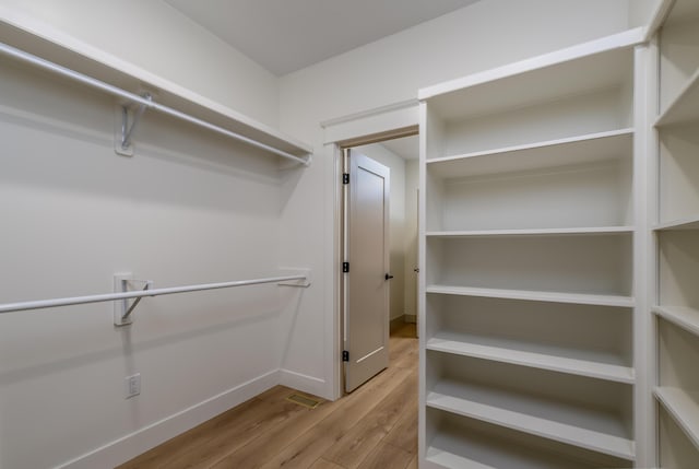3800 W Broadmoor St, Springfield, MO 65807 - spacious closet featuring wood finished floors