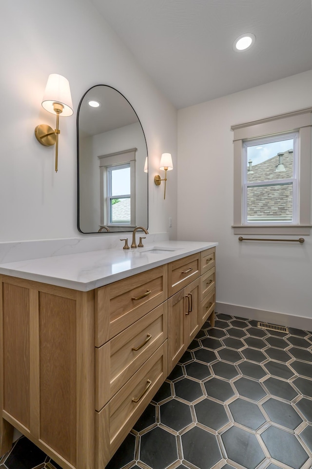 3800 W Broadmoor St, Springfield, MO 65807 - bathroom featuring vanity and recessed lighting