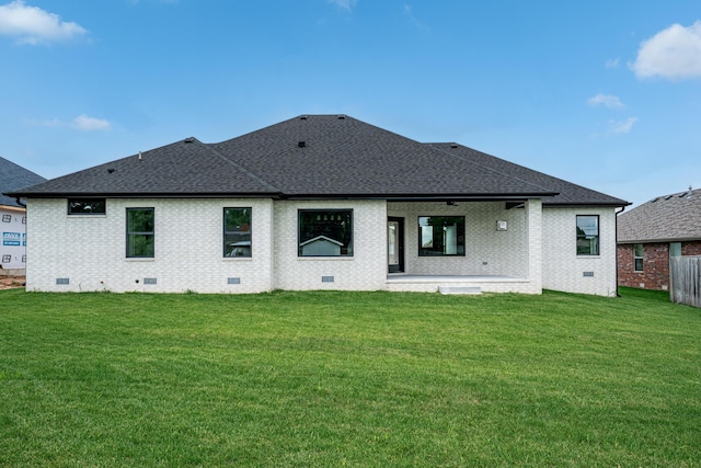 3800 W Broadmoor St, Springfield, MO 65807 - rear view of house with crawl space, a shingled roof, brick siding, and a patio area