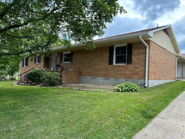 203 Roberts Dr, Mount Vernon, MO 65712 - ranch-style house featuring brick siding, a front lawn, and a garage