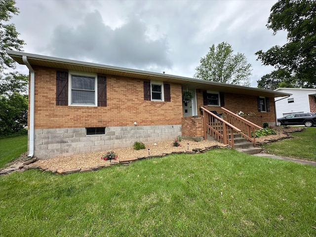 203 Roberts Dr, Mount Vernon, MO 65712 - ranch-style house featuring a front lawn and brick siding