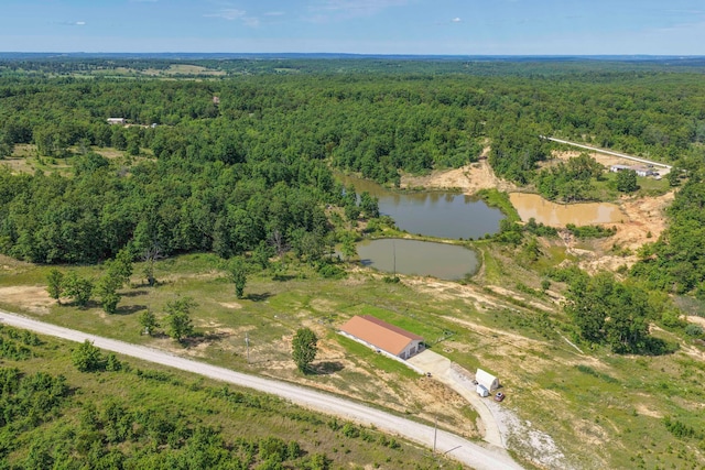 3600 Steven Dr, Cabool, MO 65689 - aerial view of property and surrounding area featuring a heavily wooded area and a nearby body of water