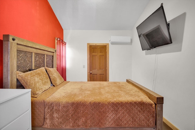bedroom featuring a wall mounted AC
