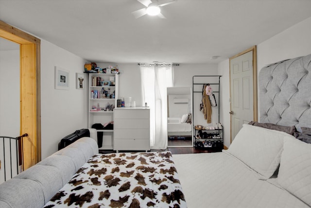 bedroom featuring wood finished floors