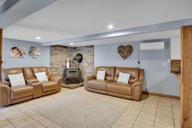 living room with a wood stove, light tile patterned floors, recessed lighting, and an AC wall unit