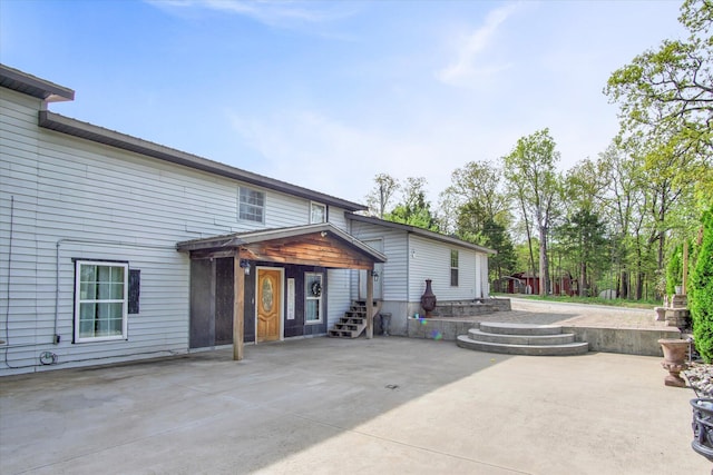 rear view of house with a patio area