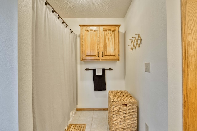 50 Tall Tree Dr, Strafford, MO 65757 - bathroom with tile patterned flooring and baseboards