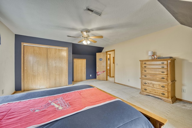 50 Tall Tree Dr, Strafford, MO 65757 - bedroom with carpet flooring, vaulted ceiling, visible vents, a ceiling fan, and a closet