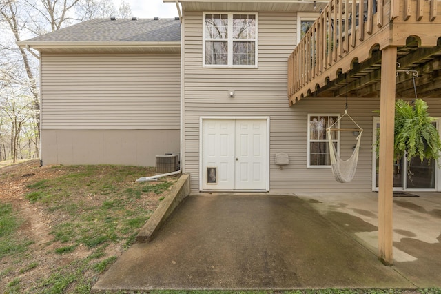 50 Tall Tree Dr, Strafford, MO 65757 - back of house featuring a patio area, cooling unit, and a shingled roof