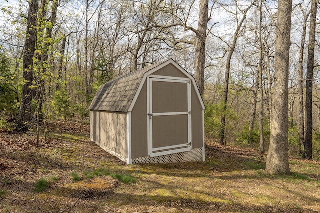 50 Tall Tree Dr, Strafford, MO 65757 - view of shed featuring a view of trees