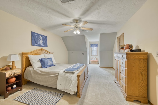 50 Tall Tree Dr, Strafford, MO 65757 - bedroom featuring a ceiling fan, a textured ceiling, light colored carpet, lofted ceiling, and visible vents