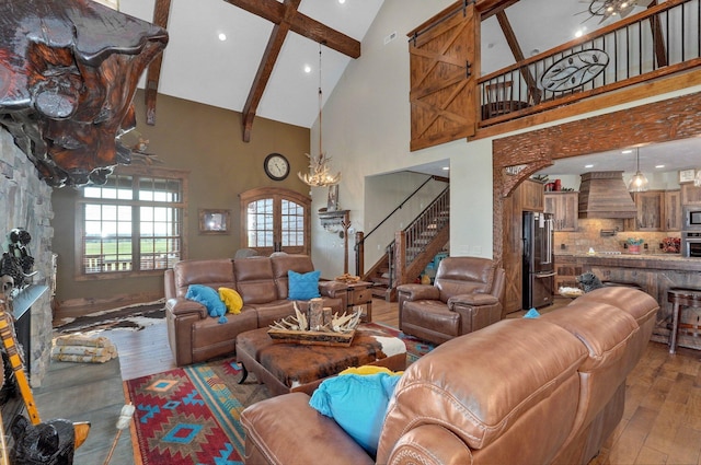 231 Cedar Stone, Ozark, MO 65721 - living area with recessed lighting, stairway, wood-type flooring, beam ceiling, and high vaulted ceiling
