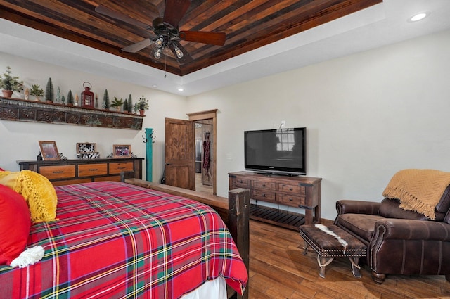 231 Cedar Stone, Ozark, MO 65721 - bedroom featuring hardwood / wood-style flooring, a tray ceiling, recessed lighting, and ceiling fan
