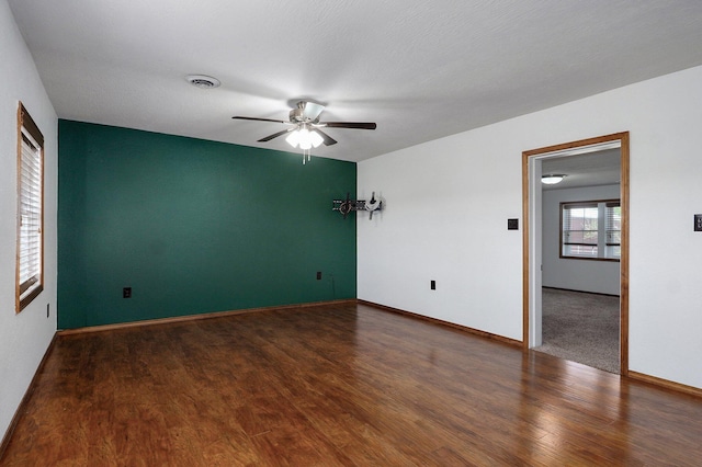 231 Cedar Stone, Ozark, MO 65721 - unfurnished room featuring visible vents, baseboards, wood finished floors, and ceiling fan