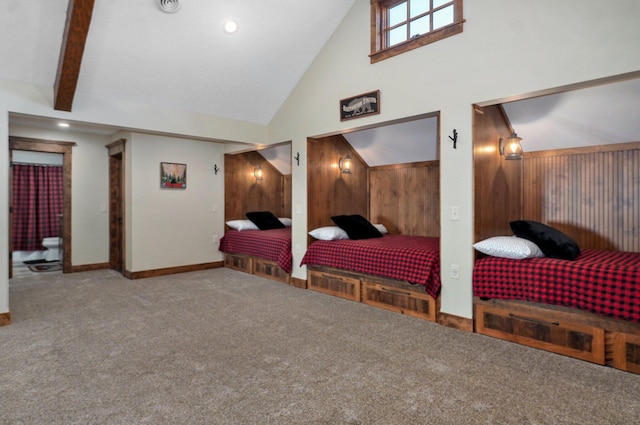 231 Cedar Stone, Ozark, MO 65721 - carpeted bedroom featuring baseboards, wood walls, and high vaulted ceiling