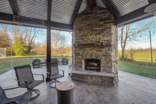 231 Cedar Stone, Ozark, MO 65721 - view of patio / terrace with an outdoor stone fireplace