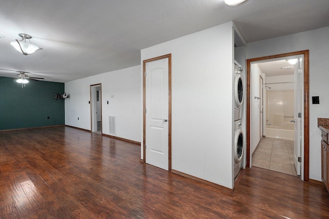 231 Cedar Stone, Ozark, MO 65721 - interior space featuring a ceiling fan, stacked washer / dryer, wood finished floors, and laundry area