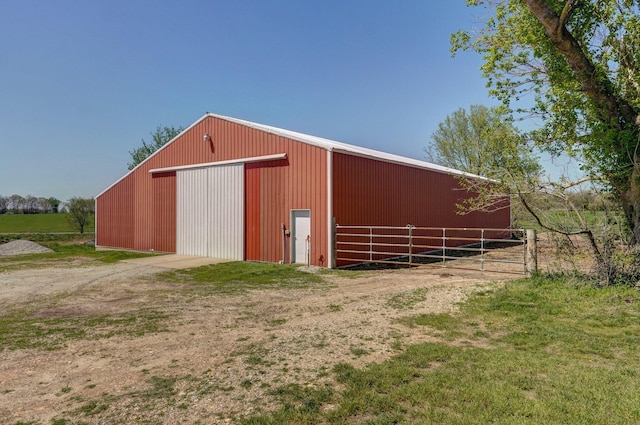 231 Cedar Stone, Ozark, MO 65721 - view of pole building featuring dirt driveway