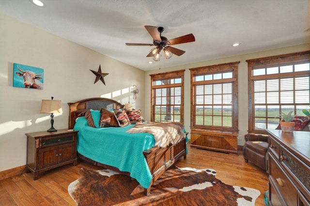 231 Cedar Stone, Ozark, MO 65721 - bedroom featuring light wood finished floors, recessed lighting, and multiple windows