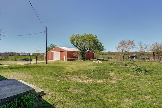231 Cedar Stone, Ozark, MO 65721 - view of yard featuring a pole building, a detached garage, and an outbuilding
