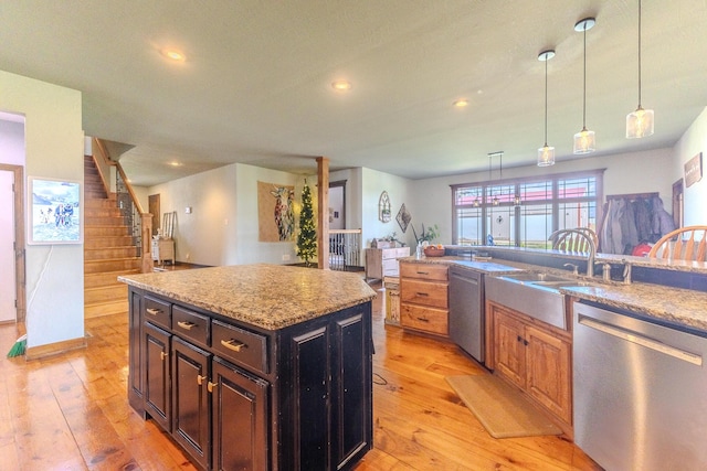 19800 Providence Dr, Lebanon, MO 65536 - kitchen featuring dishwasher, decorative light fixtures, recessed lighting, and light wood-style flooring