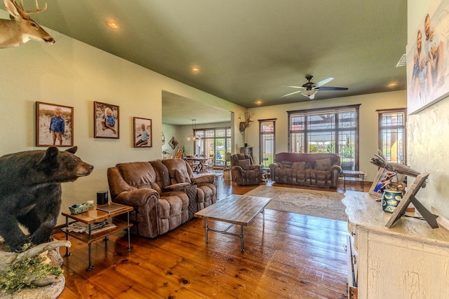 19800 Providence Dr, Lebanon, MO 65536 - living area featuring wood-type flooring, a healthy amount of sunlight, a ceiling fan, and recessed lighting