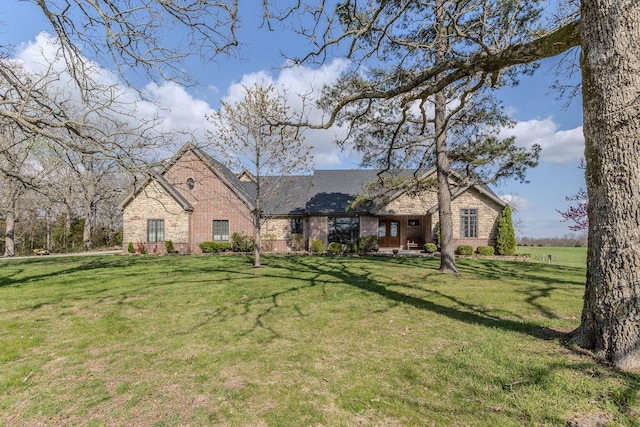 19800 Providence Dr, Lebanon, MO 65536 - view of front of house featuring brick siding and a front yard