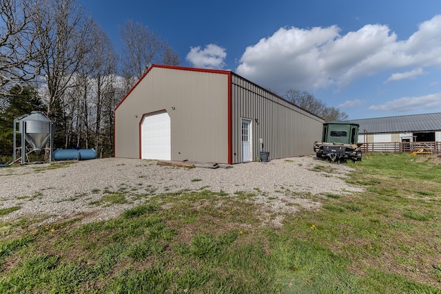 19800 Providence Dr, Lebanon, MO 65536 - view of outbuilding with fence and an outbuilding