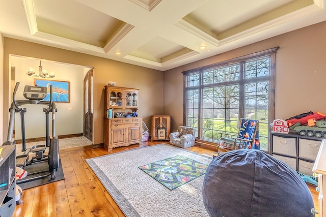 19800 Providence Dr, Lebanon, MO 65536 - sitting room featuring coffered ceiling, beamed ceiling, baseboards, a chandelier, and light wood-style flooring