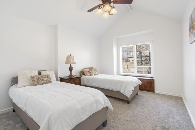 bedroom featuring lofted ceiling, light carpet, baseboards, and ceiling fan