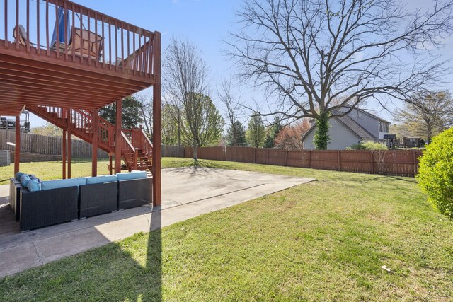 view of yard with a fenced backyard, stairway, a deck, an outdoor hangout area, and a patio