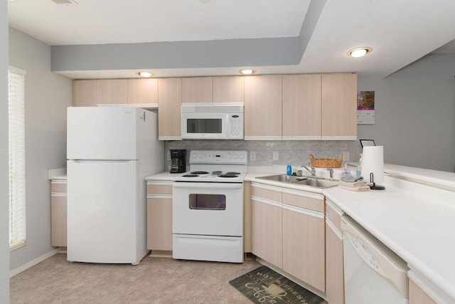 720 Fall Creek Dr Unit 3, Branson, MO 65616 - kitchen with white appliances, light brown cabinets, light countertops, a sink, and recessed lighting