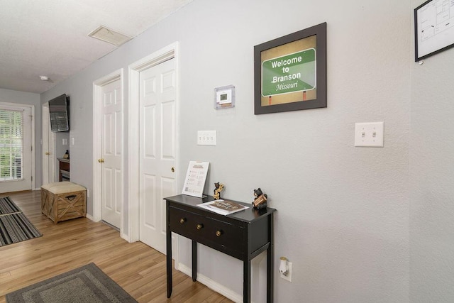 720 Fall Creek Dr Unit 3, Branson, MO 65616 - corridor featuring light wood-type flooring