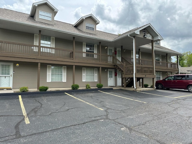 27 Fall Creek Dr, Branson, MO 65616 - view of property featuring uncovered parking and stairway