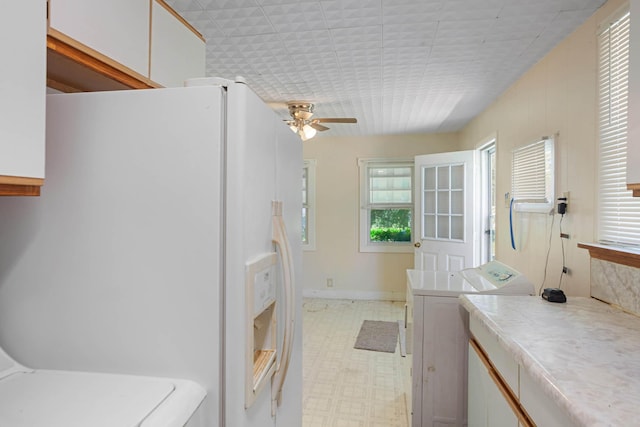 295 Glendale St, Rockaway Beach, MO 65740 - washroom with light floors, ceiling fan, independent washer and dryer, and cabinet space