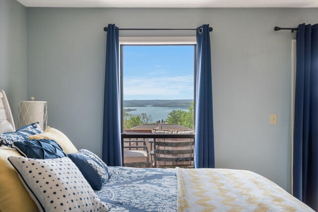 67 Port Dr Unit 7, Kimberling City, MO 65686 - bedroom with a water view