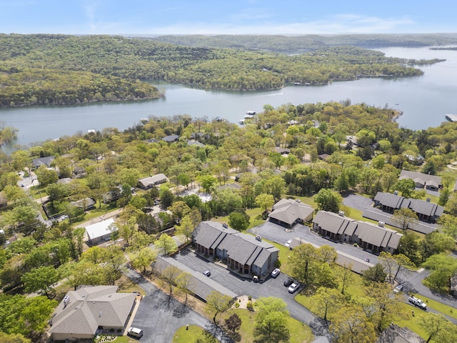 67 Port Dr Unit 7, Kimberling City, MO 65686 - bird's eye view with a wooded view, a residential view, and a water view