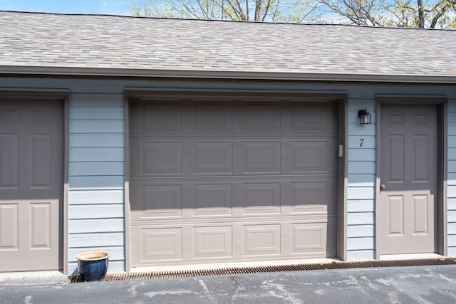 67 Port Dr Unit 7, Kimberling City, MO 65686 - view of garage