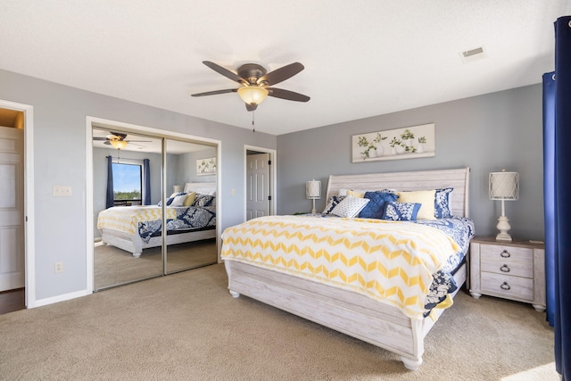 67 Port Dr Unit 7, Kimberling City, MO 65686 - carpeted bedroom with a closet, visible vents, ceiling fan, and baseboards
