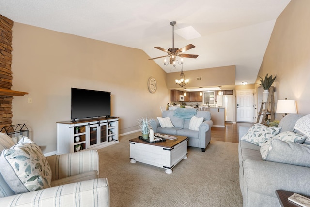 67 Port Dr Unit 7, Kimberling City, MO 65686 - living area with baseboards, light colored carpet, ceiling fan with notable chandelier, and lofted ceiling