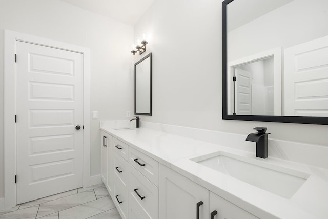 5913 S Clay Ave, Springfield, MO 65810 - full bath featuring marble finish floor, a sink, and double vanity