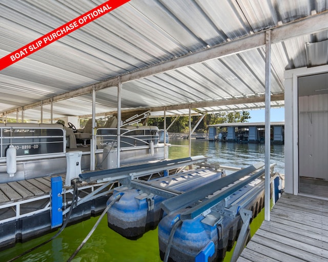 view of dock with a water view and boat lift