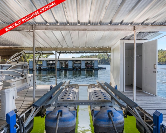 view of dock featuring a water view and boat lift