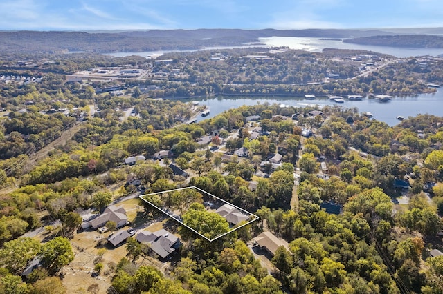 aerial view featuring a water and mountain view