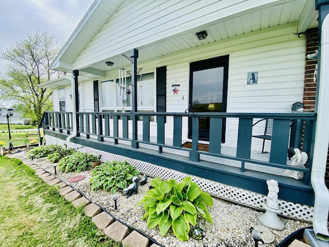 wooden deck featuring covered porch