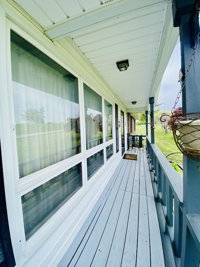 wooden terrace with covered porch