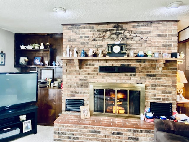 living room featuring a brick fireplace, a textured ceiling, and wooden walls